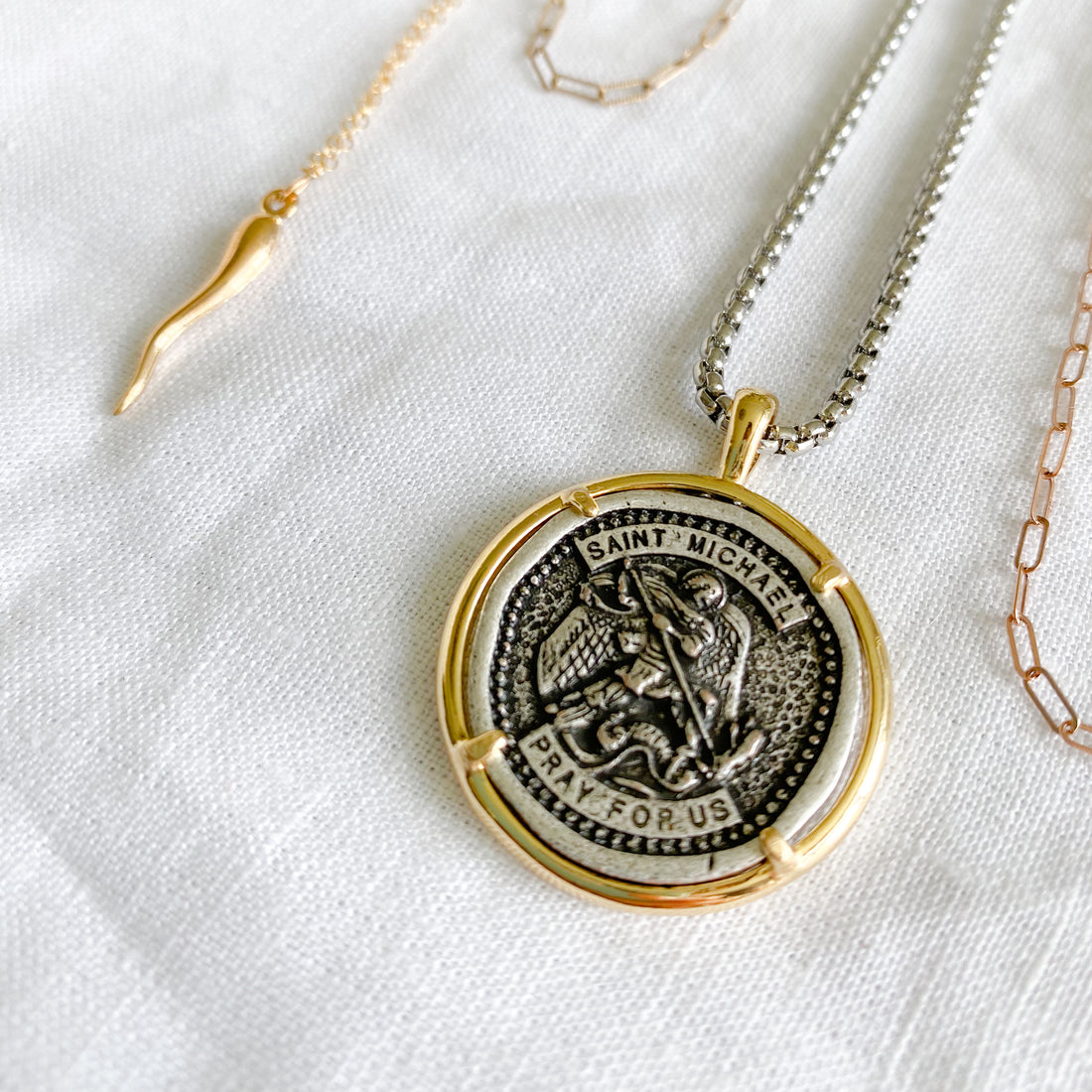 The Meanings Behind the Medal: St. Michael