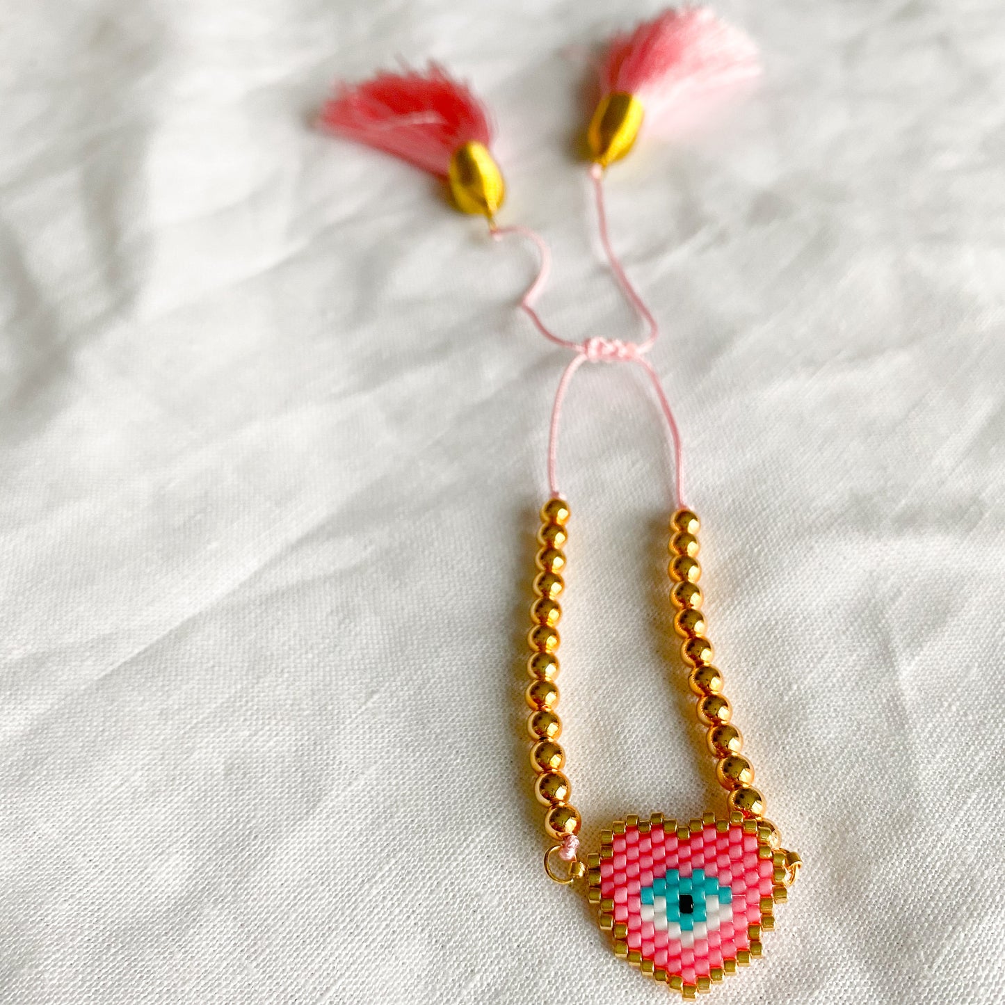Heart Evil Eye Pink Tassel Bracelet - BelleStyle