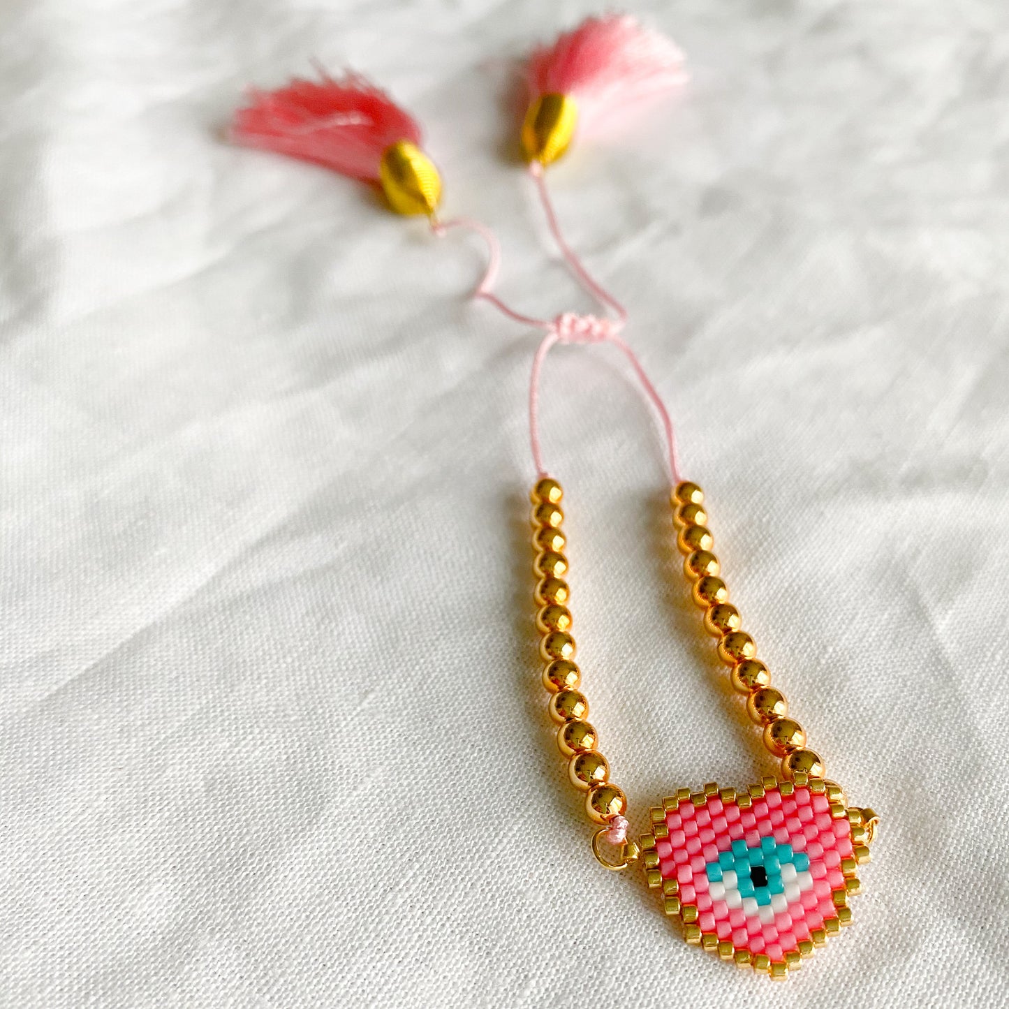 Heart Evil Eye Pink Tassel Bracelet - BelleStyle