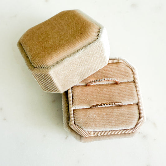 Beige velvet jewelry box on a white background