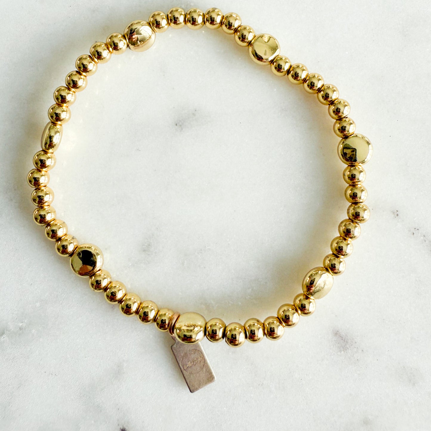 Daisy Girl’s Gold Circle Beaded Stretch Bracelet - BelleStyle