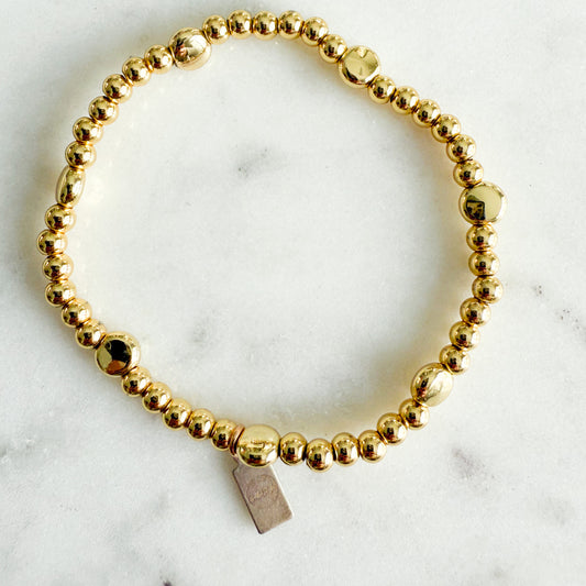 Daisy Girl’s Gold Circle Beaded Stretch Bracelet - BelleStyle