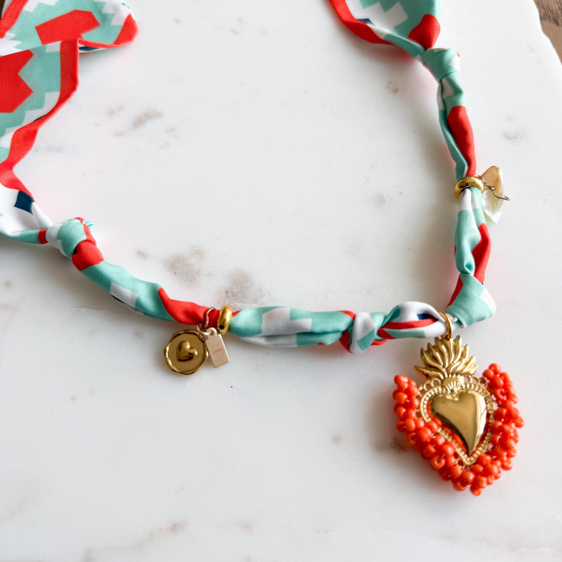 Montagne Gold Sacred Heart Charm Orange Bandanna Necklace