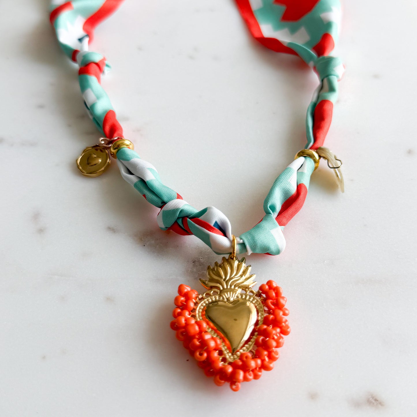 Montagne Gold Sacred Heart Charm Orange Bandanna Necklace