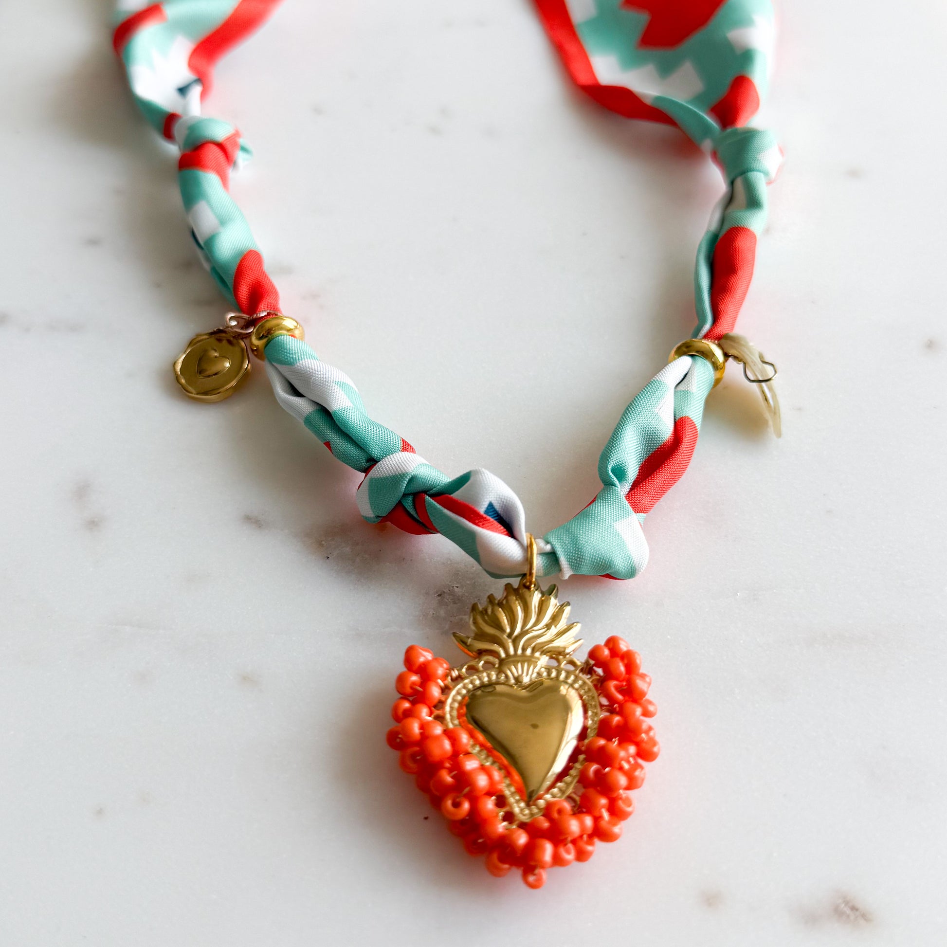 Montagne Gold Sacred Heart Charm Orange Bandanna Necklace